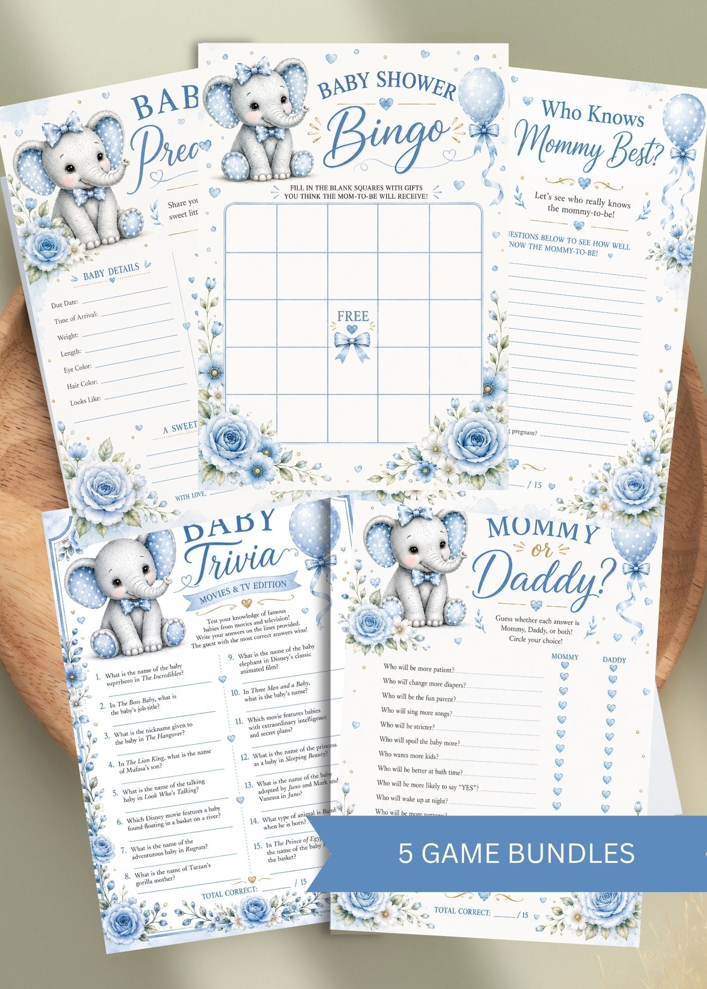 Baby shower game bundles with elephant theme on a wooden surface
