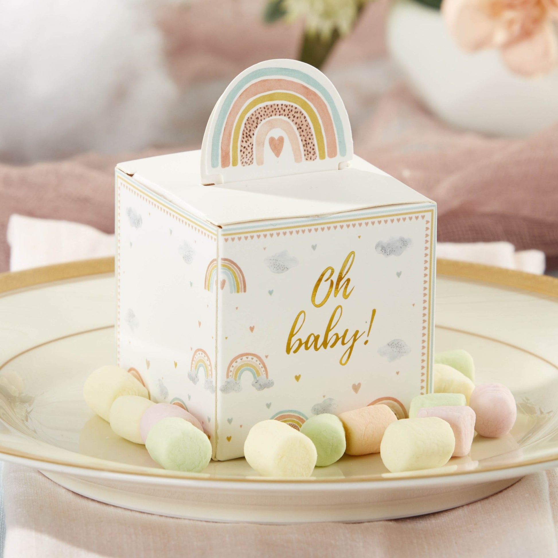 boho rainbow baby shower favor box on a plate