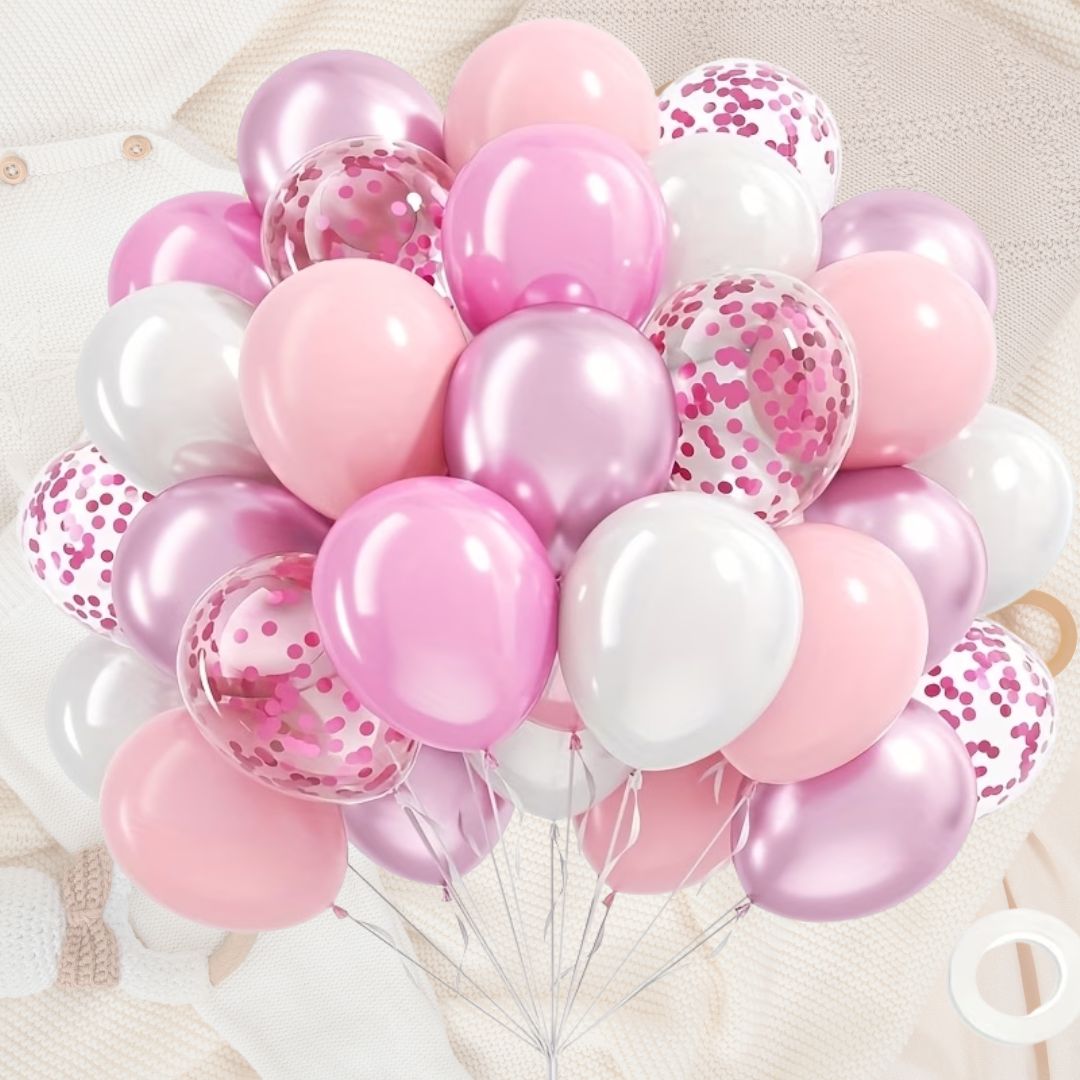 Bouquet of pink, white, and confetti balloons on a light background
